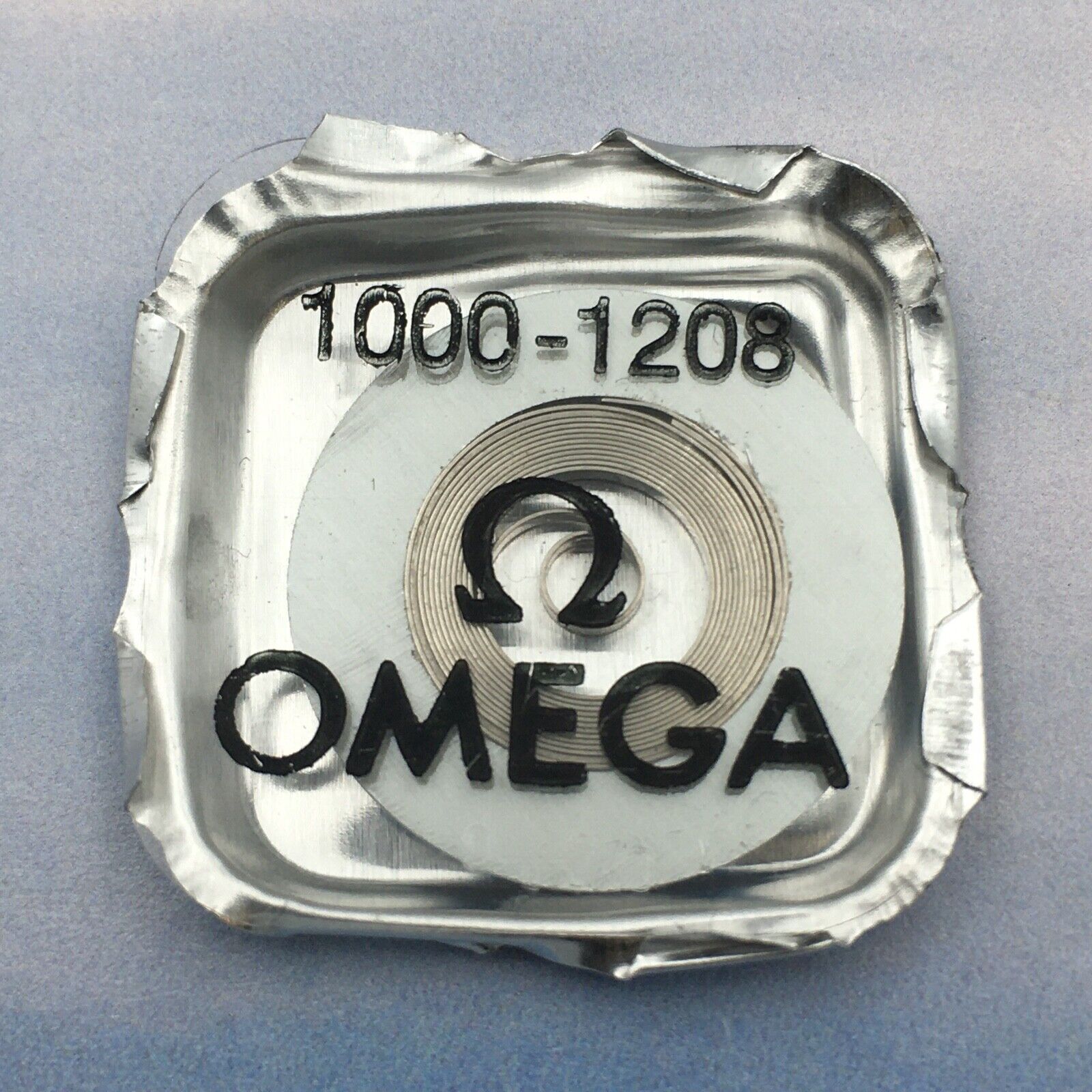 Genuine Omega 1000-1208 Mainspring. Seal Package